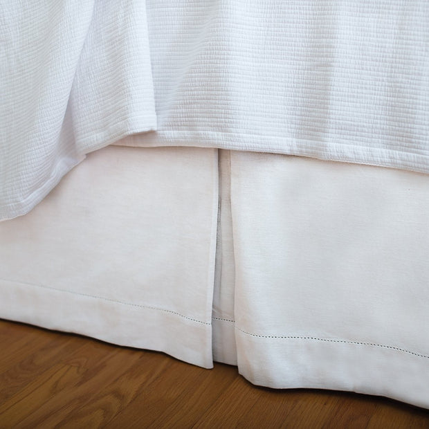 White hemstitch bed skirt with an 18 inch drop.
