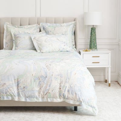 green bedding collection with marble design