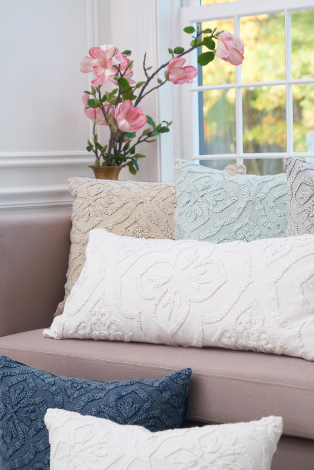 Detail shot of the Ninny decorative pillow collection.