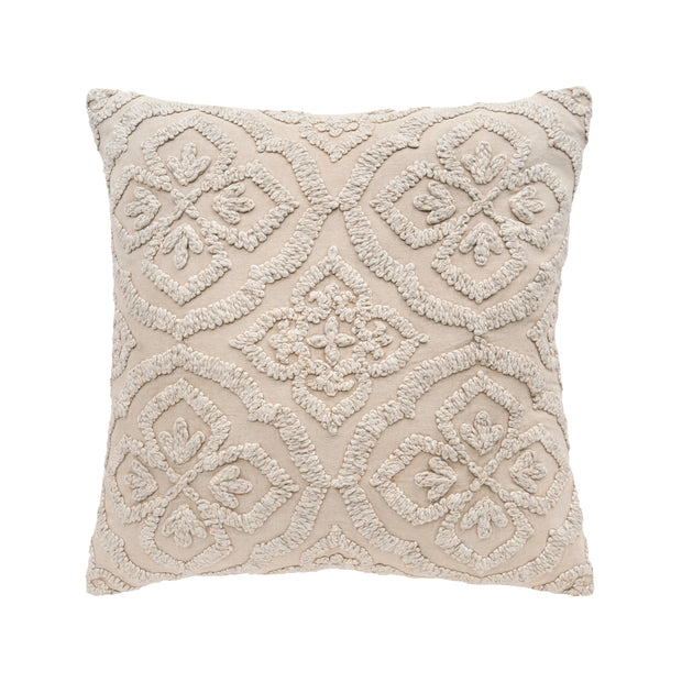 tan decorative pillow with stonewashed embroidered design