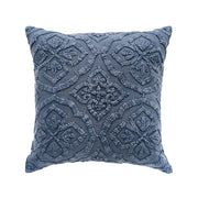 blue decorative pillow with stonewashed embroidered design