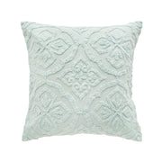 green decorative pillow with stonewashed embroidered design