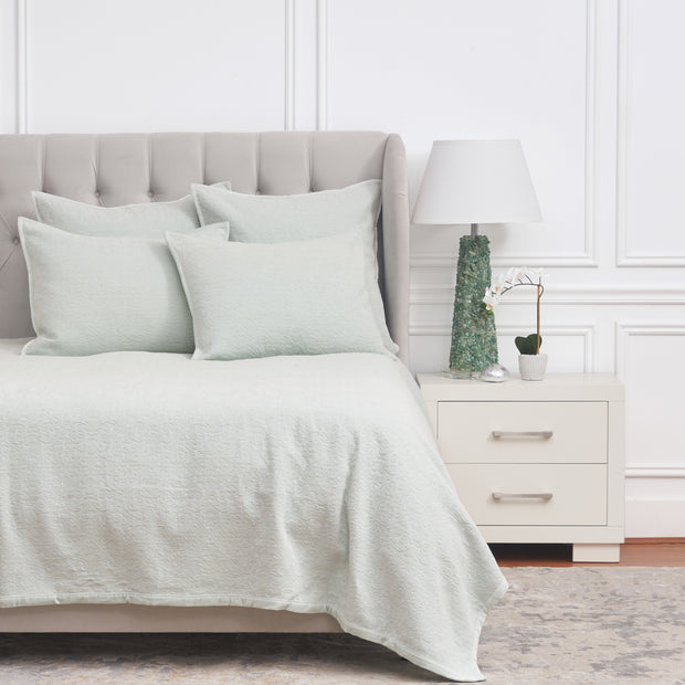light green coverlet bedding with matching pillows