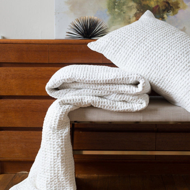 White waffle weave coverlet.